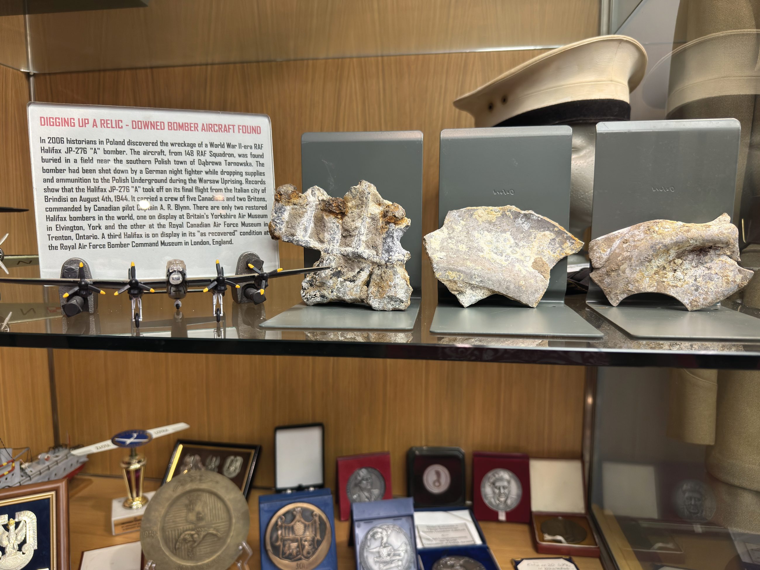 Fragments of Halifax JP276, recovered near Dąbrowa Tarnowska and held today by SPK Branch 20 in Toronto.